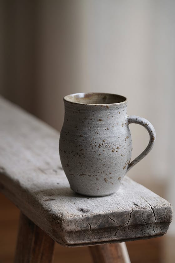 Mug with river clay decorations (#I)